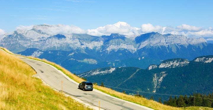 Car driving around Swiss Alps