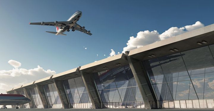 Aircraft flying over an airport