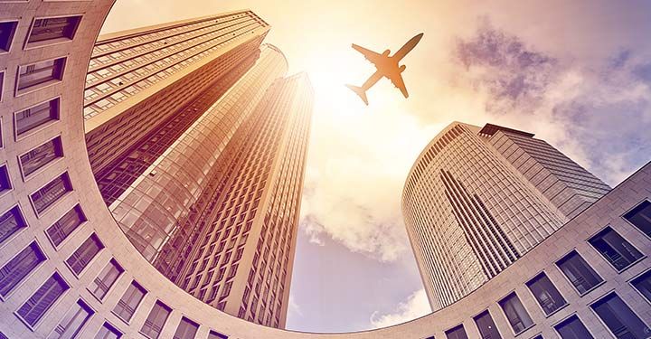 airplane over city